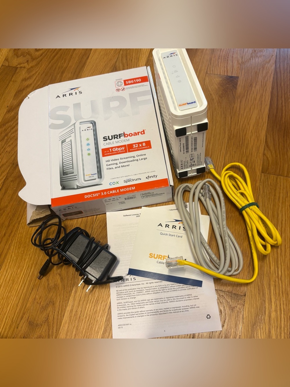 ARRIS SURFboard Cable Modem - White with Yellow Ethernet Cable